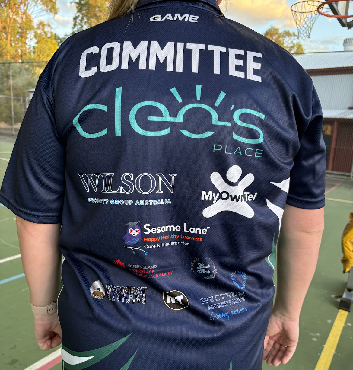 Sponsors on netball shirt, Cleos Place, Narangba Tavern, Honest Plumbing Solutions